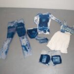 Photograph of Cyanotype clothing laying on the floor