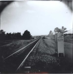 Black and white image of train tracks